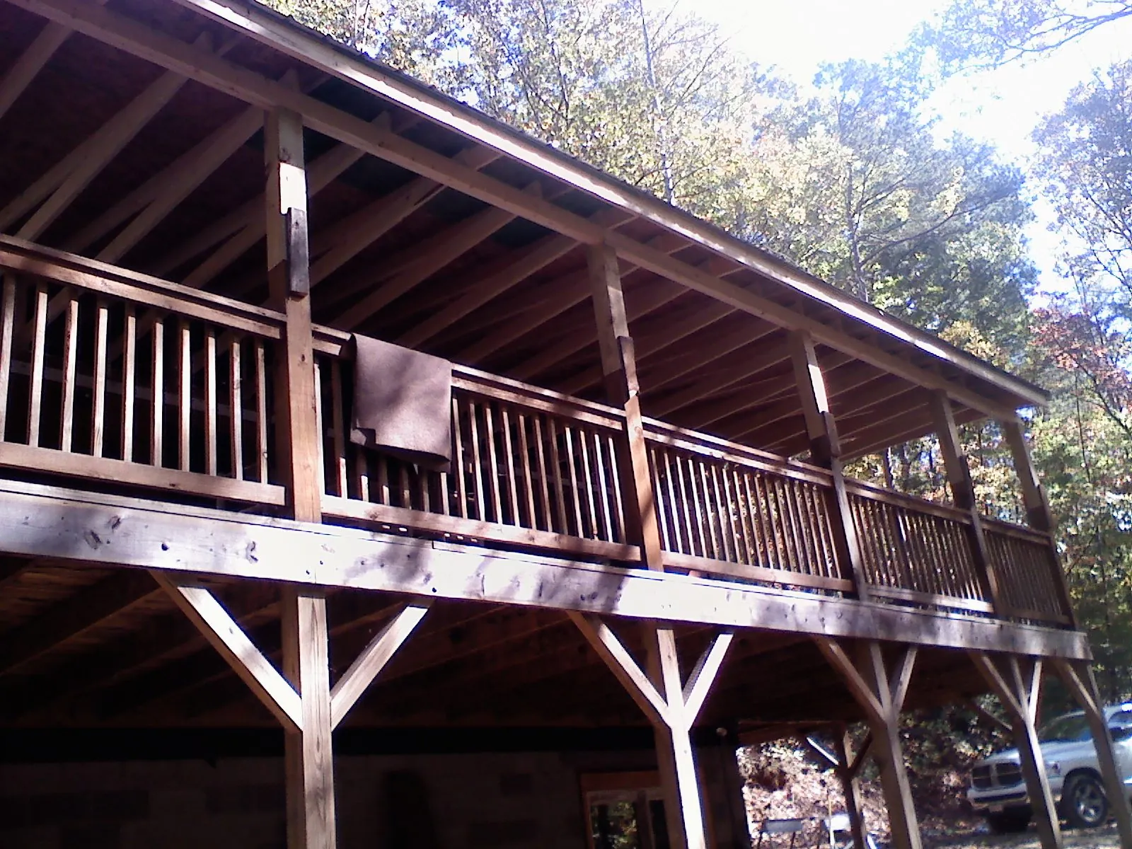 Timber framing under a new elevated porch and deck — Roof Leak Repair in Brown City by Roofing Brothers